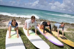 4 people taking Surfing Lesson